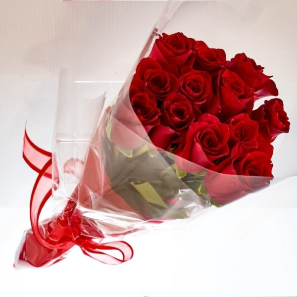 1 Dozen Imported Red Roses Plastic Wrap